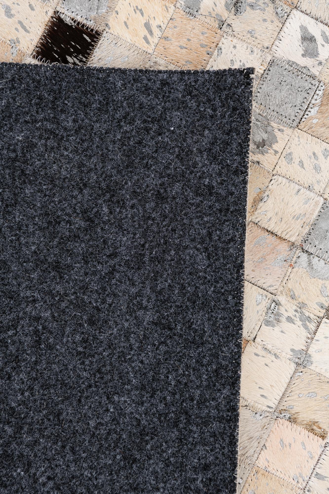 5' 5 x 7' 6 Cowhide Stocks Rug