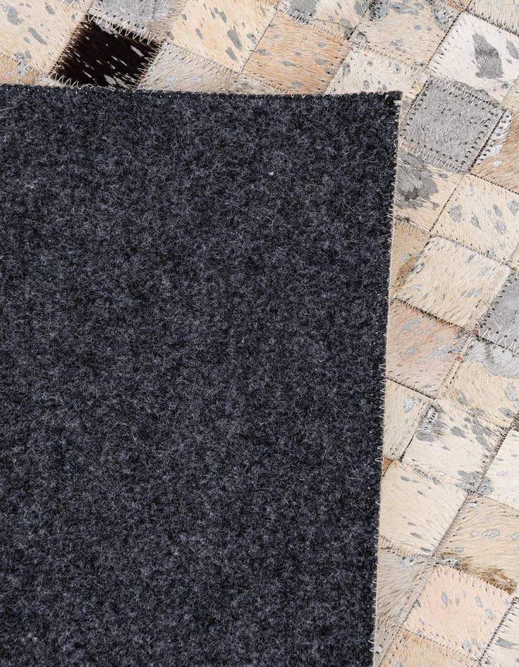 Detail image of 5' 5 x 7' 6 Cowhide Stocks Rug