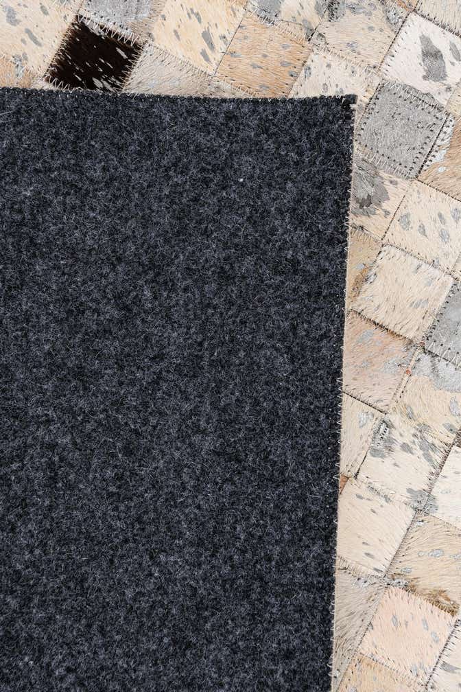 5' 5 x 7' 6 Cowhide Stocks Rug