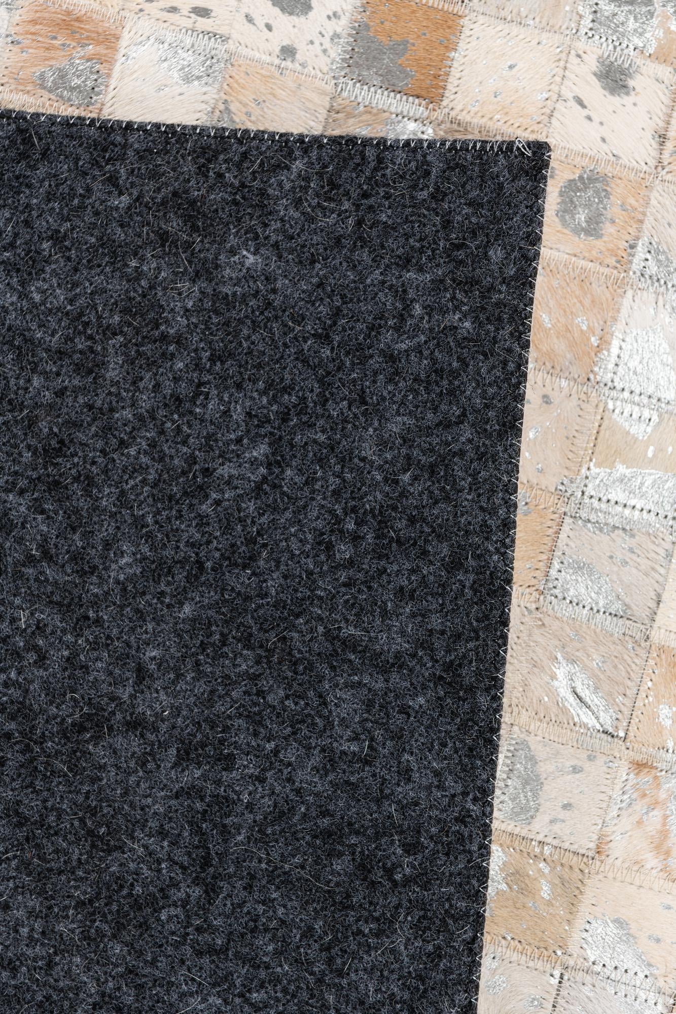 5' x 8' Cowhide Stocks Rug