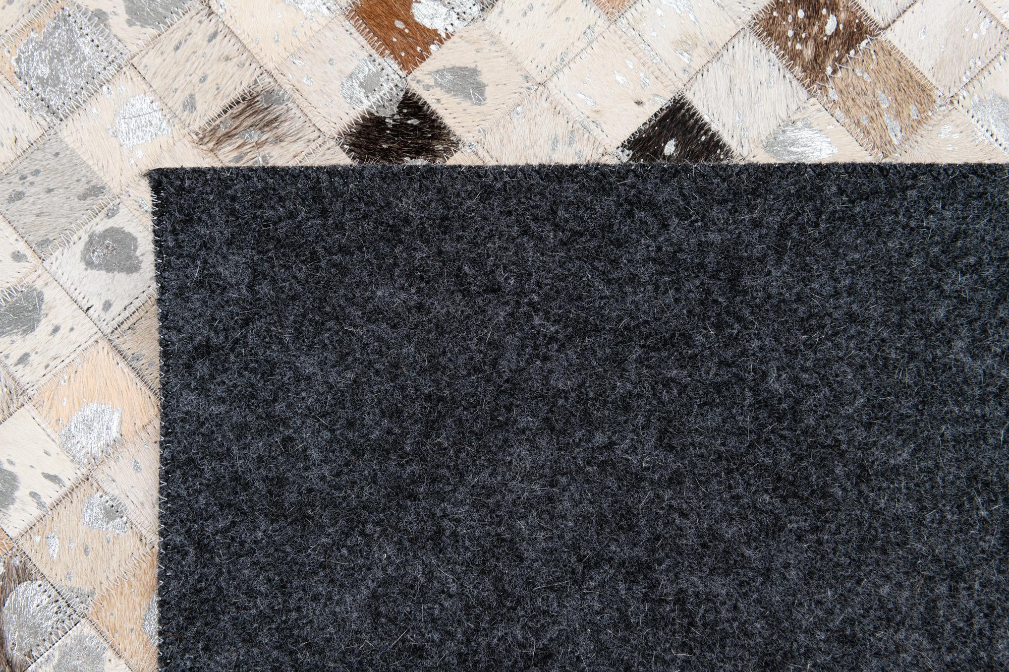 5' 1 x 7' 10 Cowhide Stocks Rug