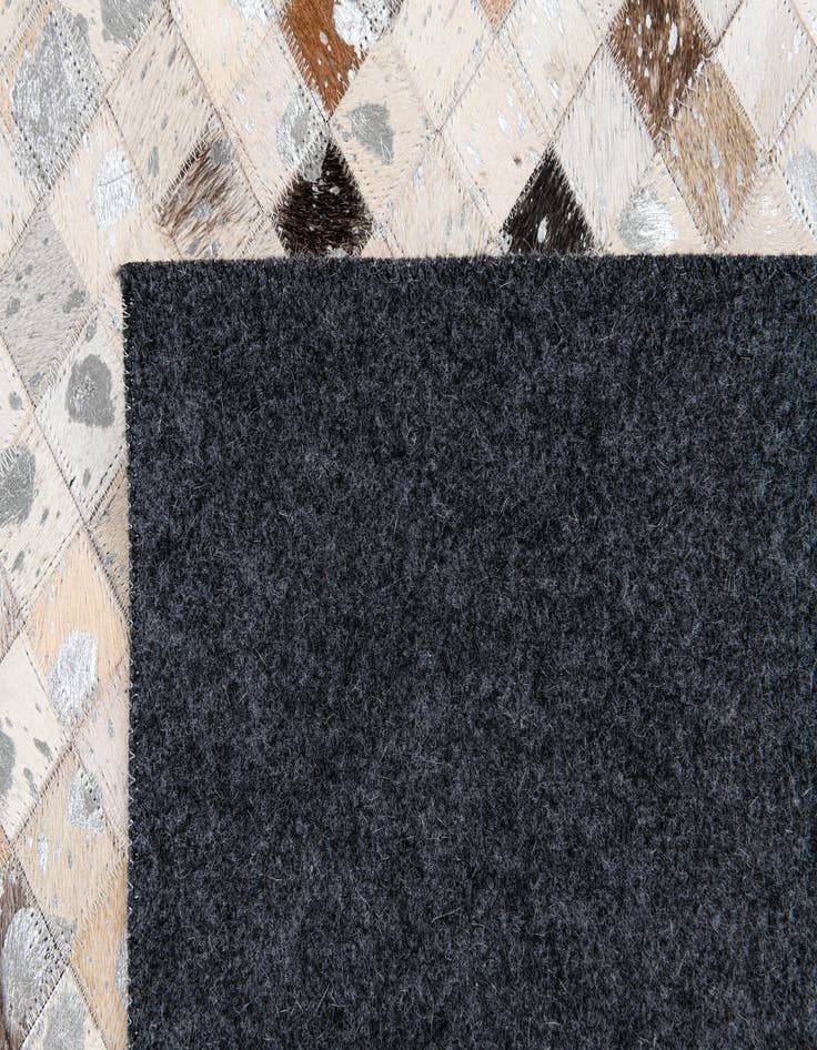 Detail image of 5' 1 x 7' 10 Cowhide Stocks Rug