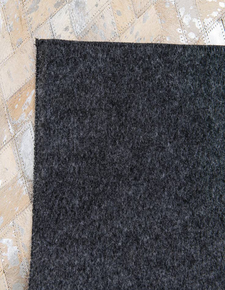 Detail image of 5' 3 x 7' 5 Cowhide Stocks Rug