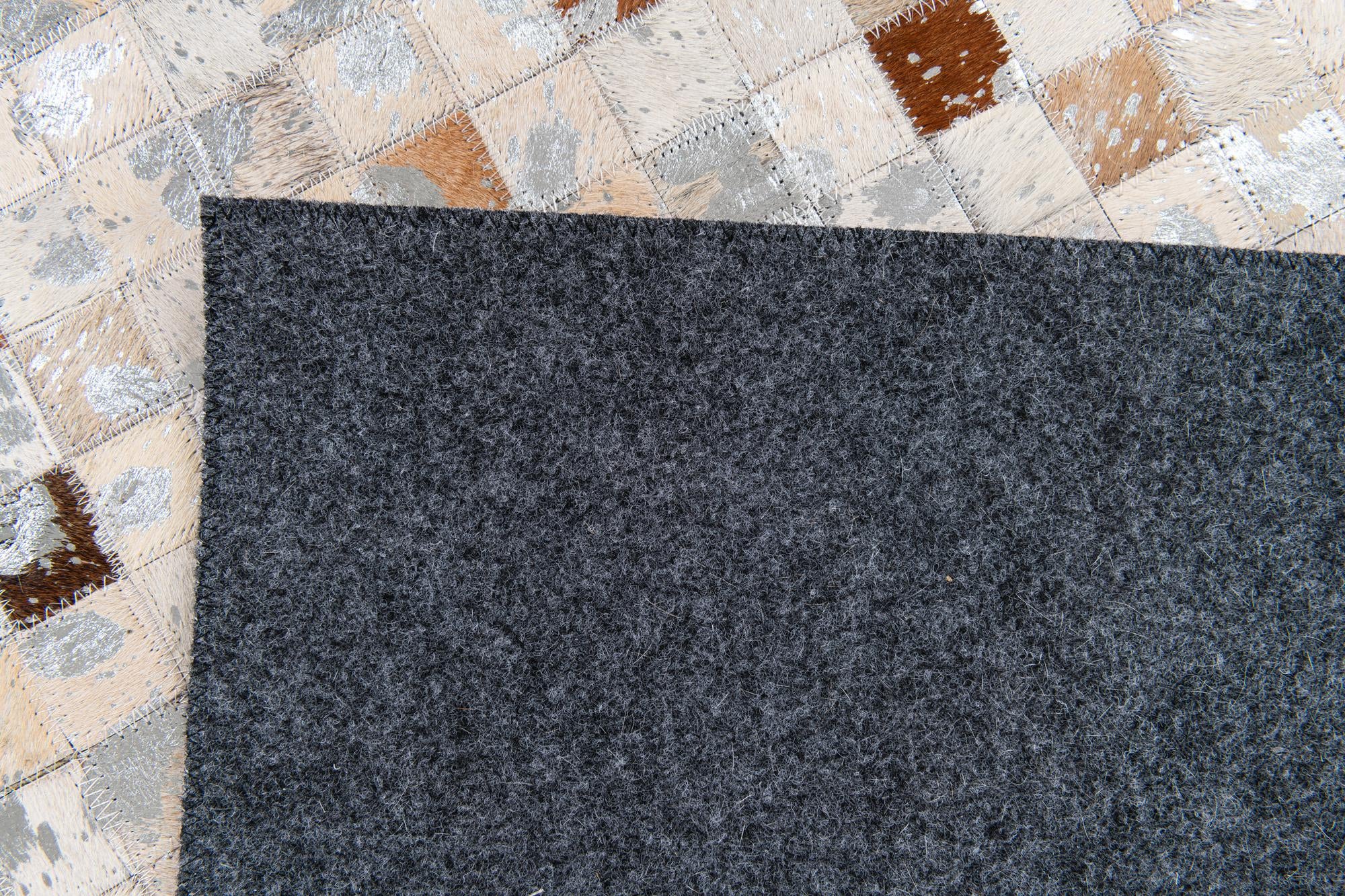 5' 1 x 7' 11 Cowhide Stocks Rug