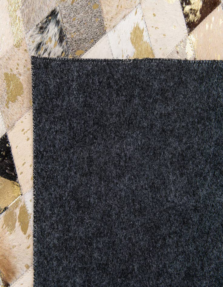 Detail image of 5' x 7' 11 Cowhide Stocks Rug