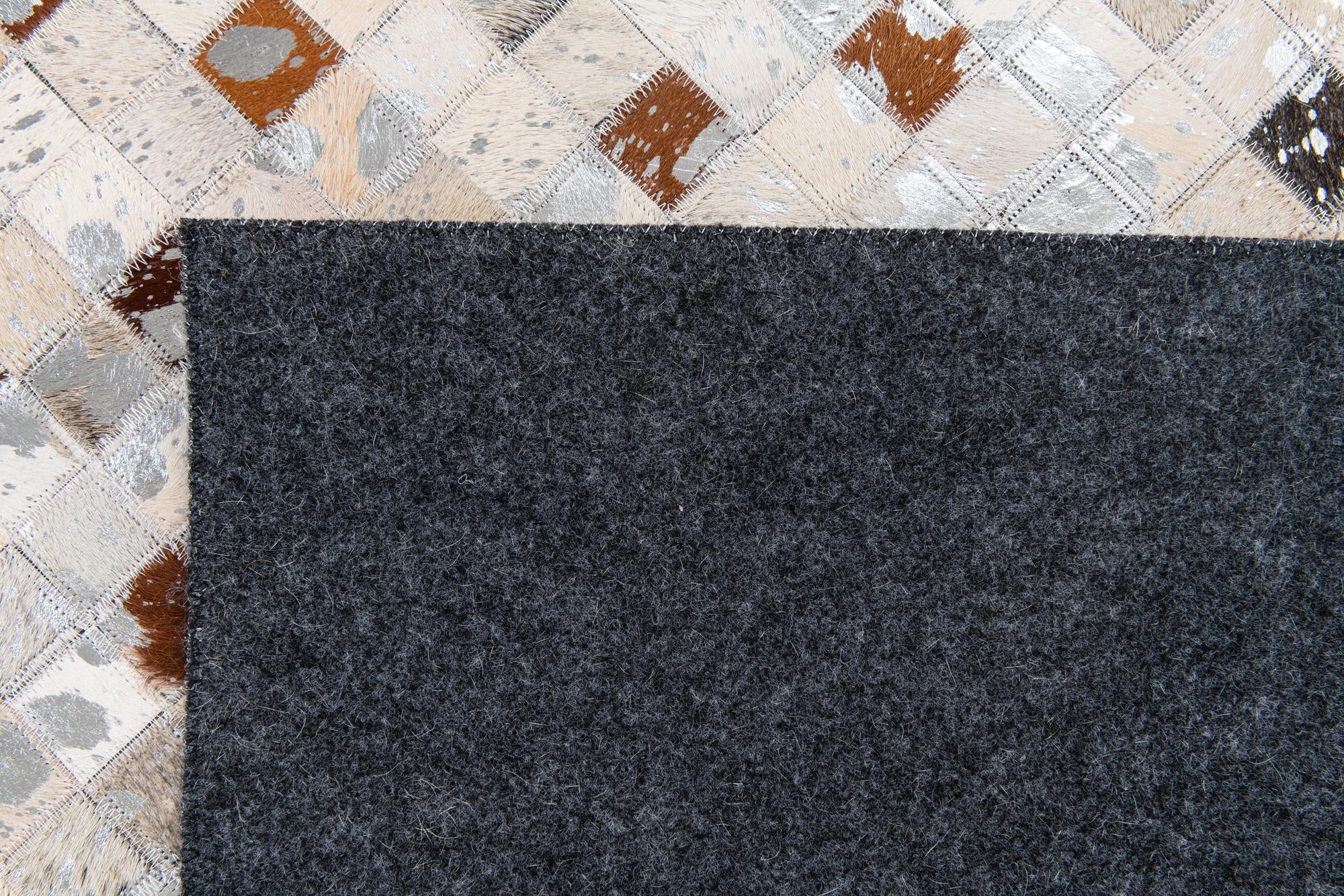 5' x 8' Cowhide Stocks Rug
