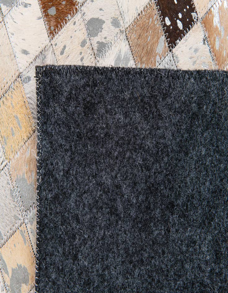 Detail image of 5' 1 x 7' 11 Cowhide Stocks Rug