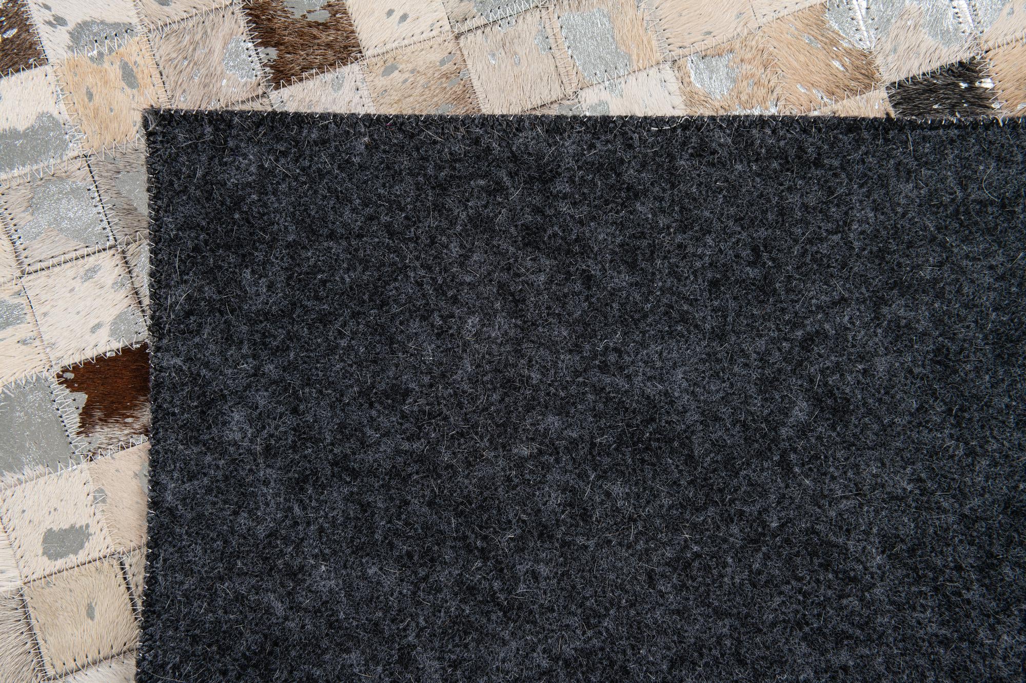 5' 1 x 7' 11 Cowhide Stocks Rug
