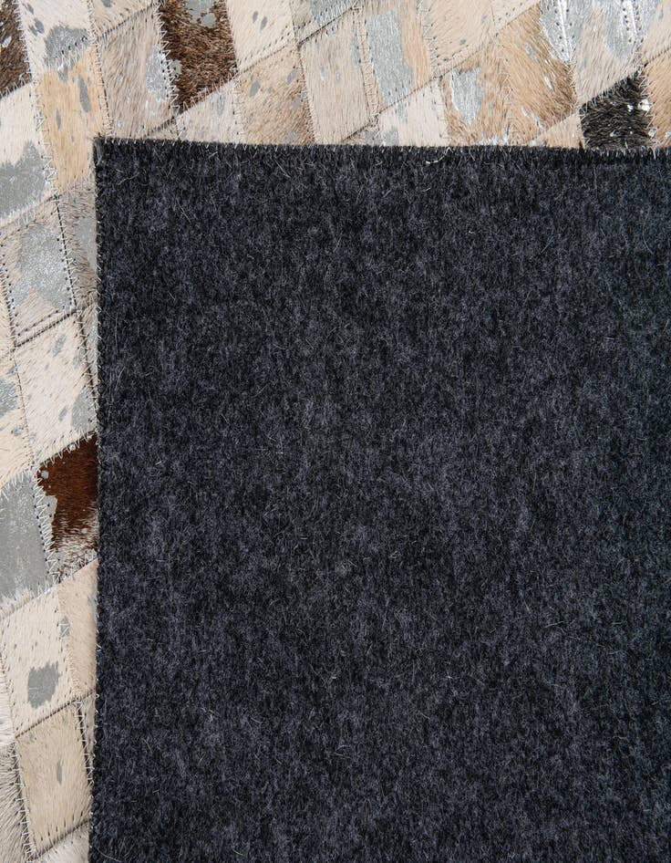 Detail image of 5' 1 x 7' 11 Cowhide Stocks Rug