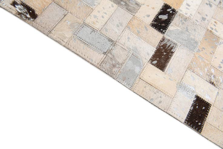 Detail image of 5' 3 x 7' 5 Cowhide Stocks Rug