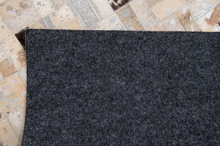 5' 3 x 7' 5 Cowhide Stocks Rug