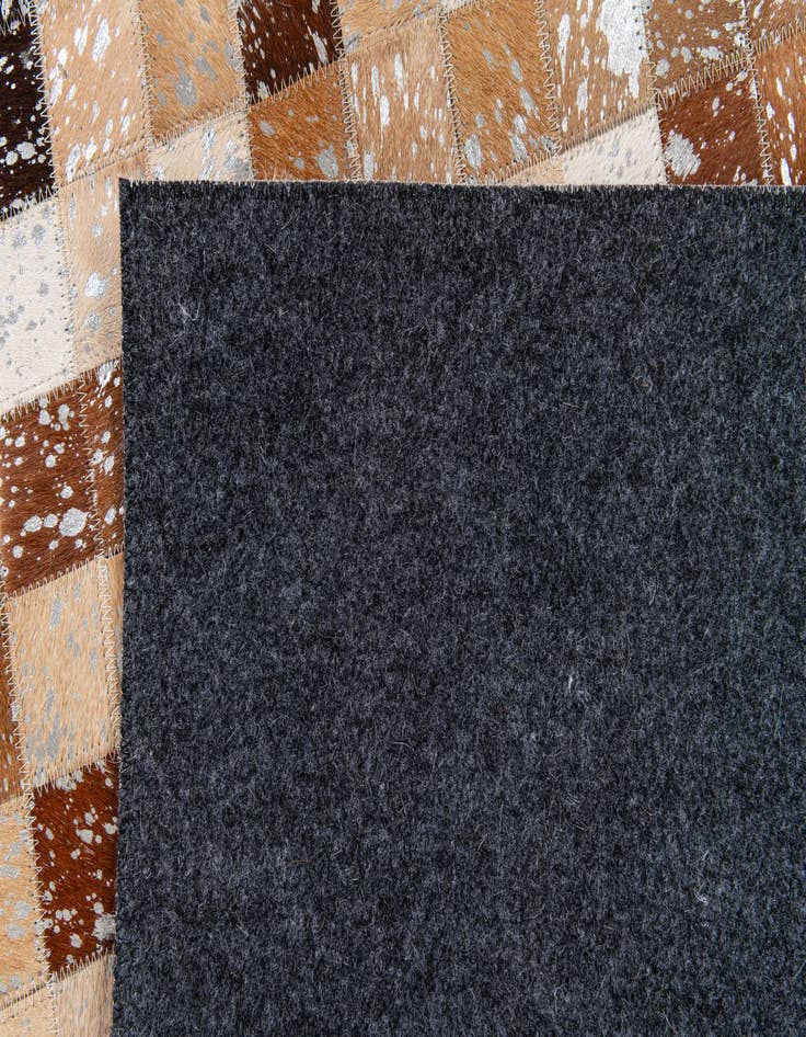 Detail image of 5' 2 x 7' 6 Cowhide Stocks Rug