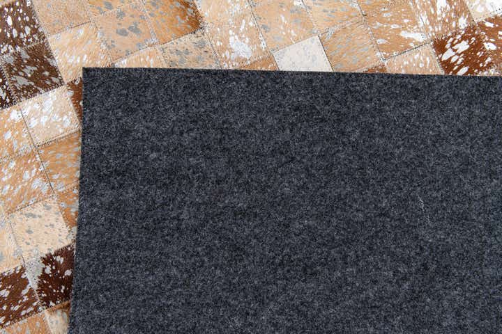 5' 3 x 7' 7 Cowhide Stocks Rug