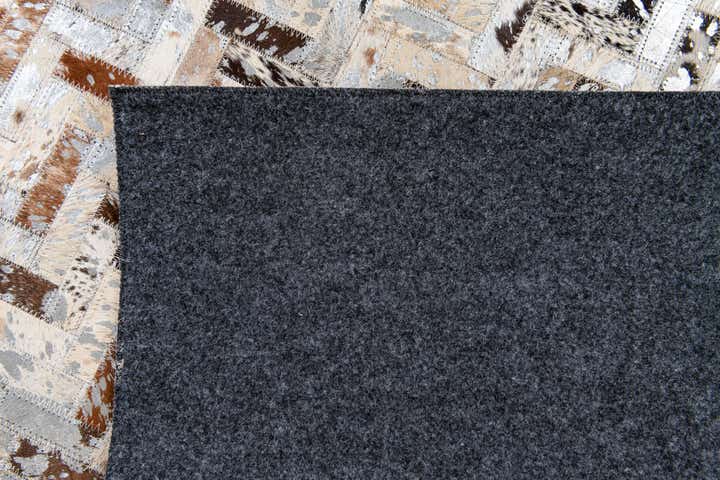 5' 3 x 7' 5 Cowhide Stocks Rug