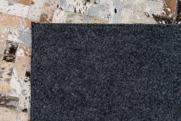 5' 3 x 7' 8 Cowhide Stocks Rug