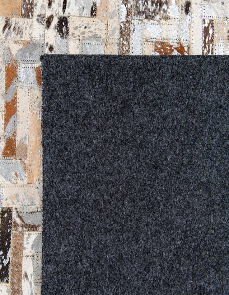 Detail image of 5' 4 x 7' 7 Cowhide Stocks Rug