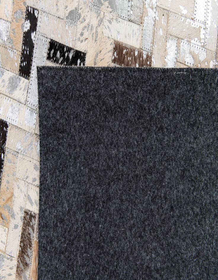 Detail image of 5' 3 x 7' 6 Cowhide Stocks Rug