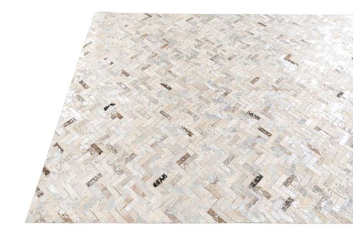 5' 5 x 7' 6 Cowhide Stocks Rug