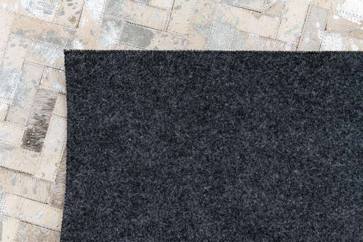 5' 5 x 7' 6 Cowhide Stocks Rug