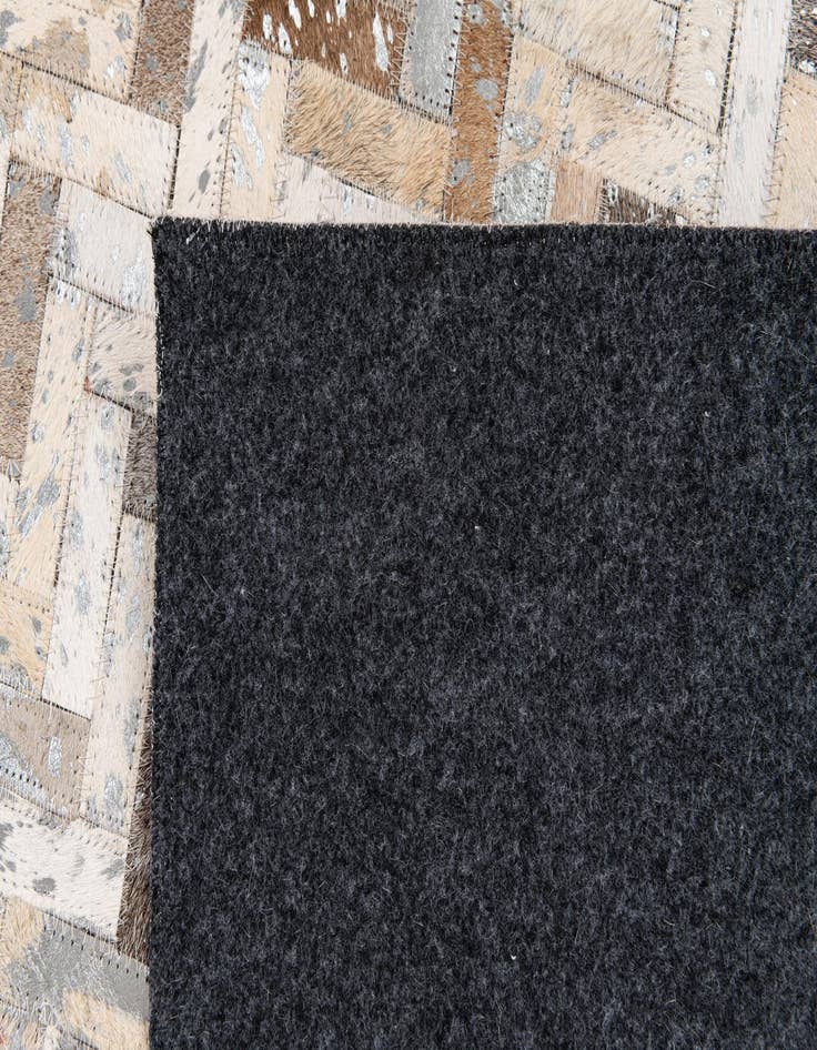 Detail image of 5' 2 x 7' 5 Cowhide Stocks Rug