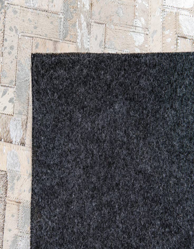 Detail image of 5' 4 x 7' 7 Cowhide Stocks Rug