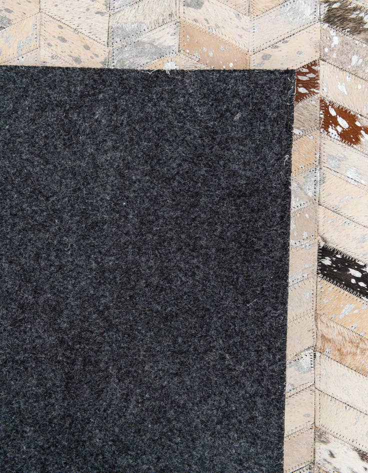 Detail image of 5' 4 x 7' 7 Cowhide Stocks Rug