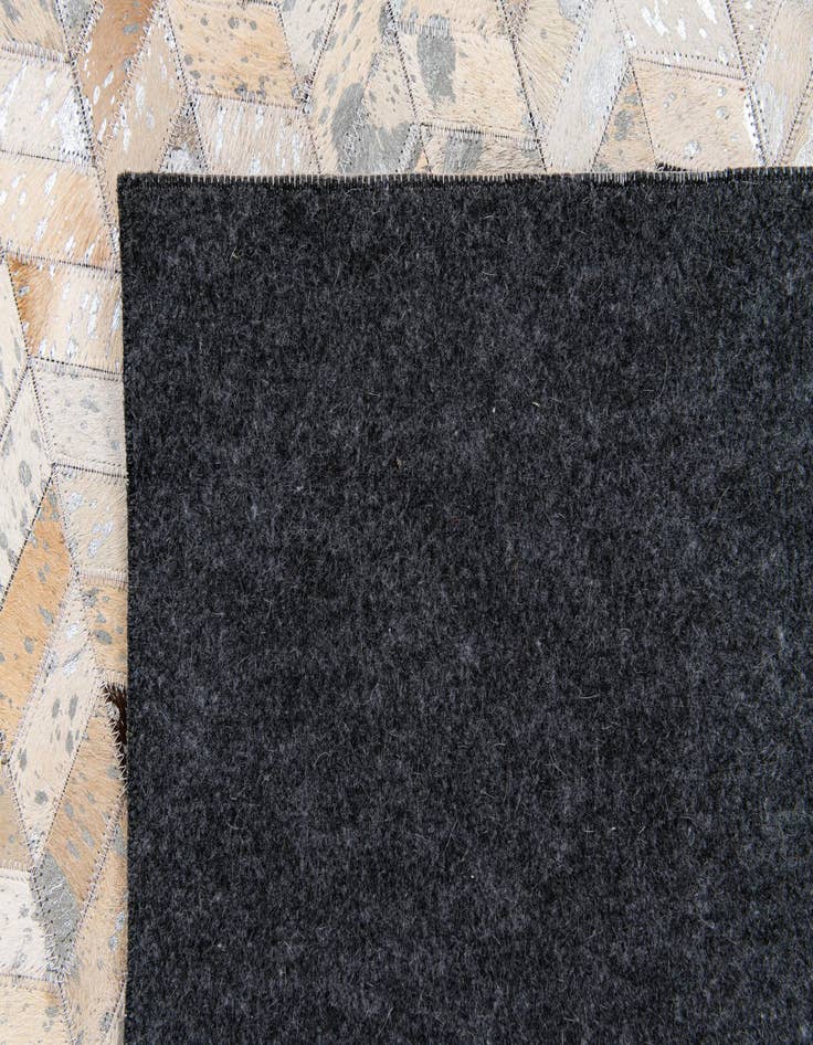 Detail image of 5' 4 x 7' 7 Cowhide Stocks Rug