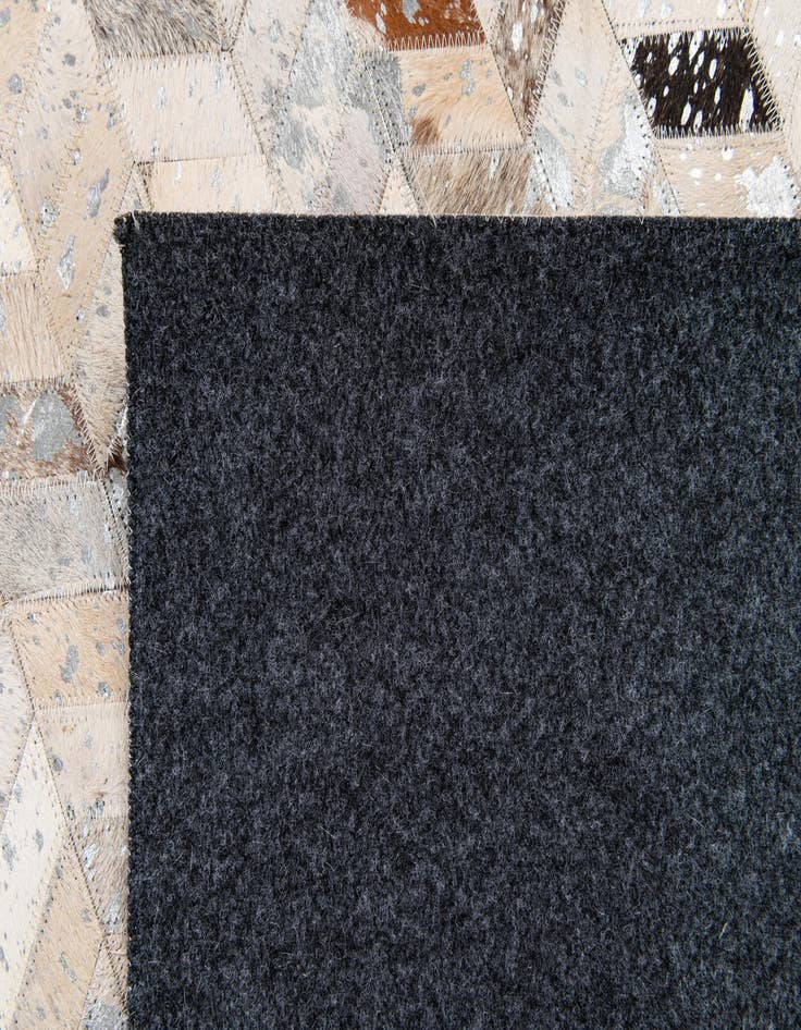 Detail image of 5' 4 x 7' 7 Cowhide Stocks Rug