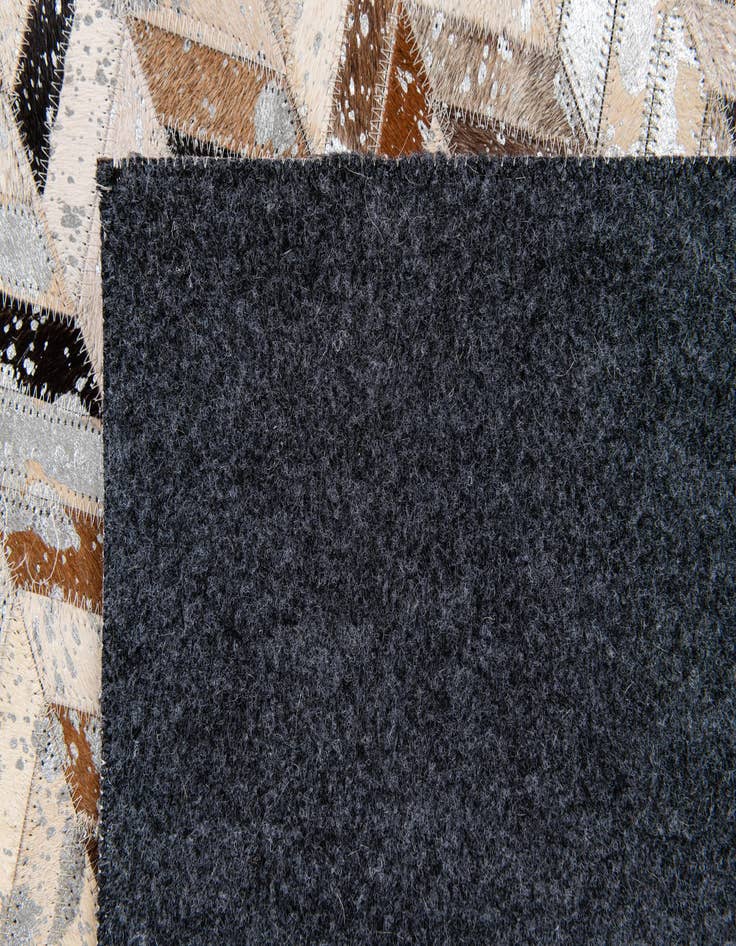 Detail image of 5' 3 x 7' 6 Cowhide Stocks Rug