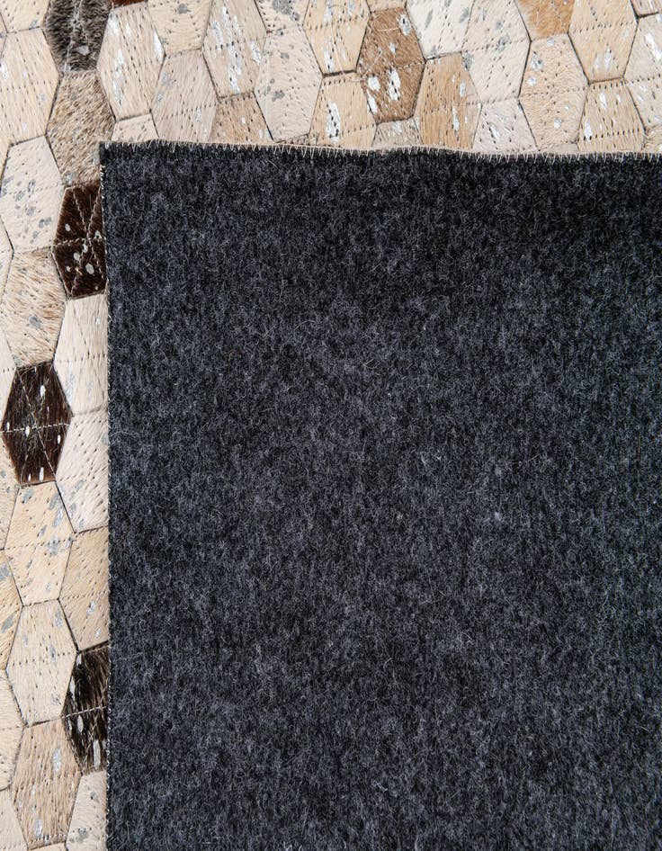Detail image of 5' 6 x 7' 7 Cowhide Stocks Rug