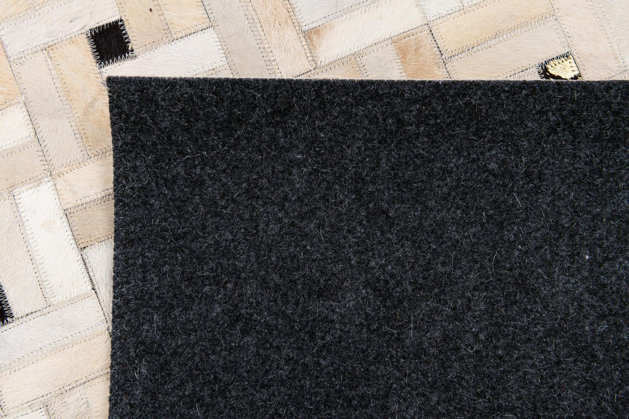5' 1 x 7' 11 Cowhide Stocks Rug