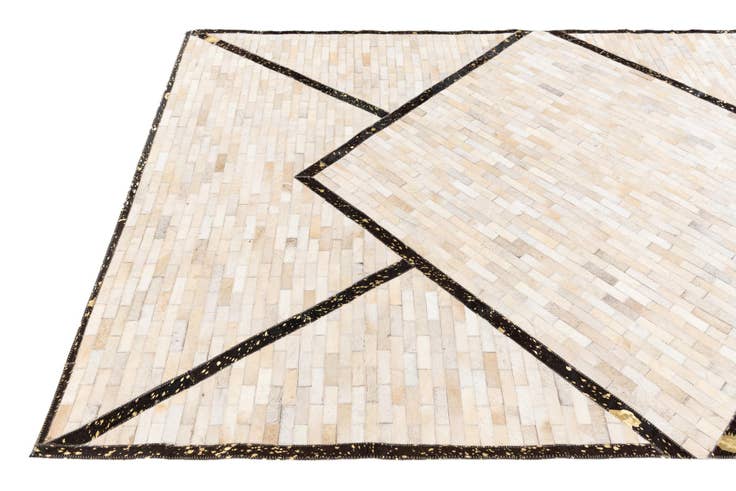 Detail image of 5' 1 x 8' 1 Cowhide Stocks Rug