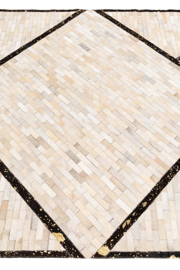 Detail image of 5' 1 x 8' 1 Cowhide Stocks Rug