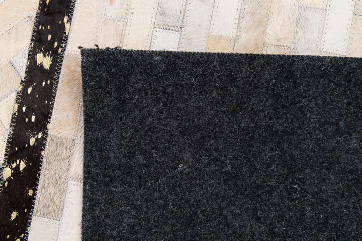 5' 1 x 8' 1 Cowhide Stocks Rug