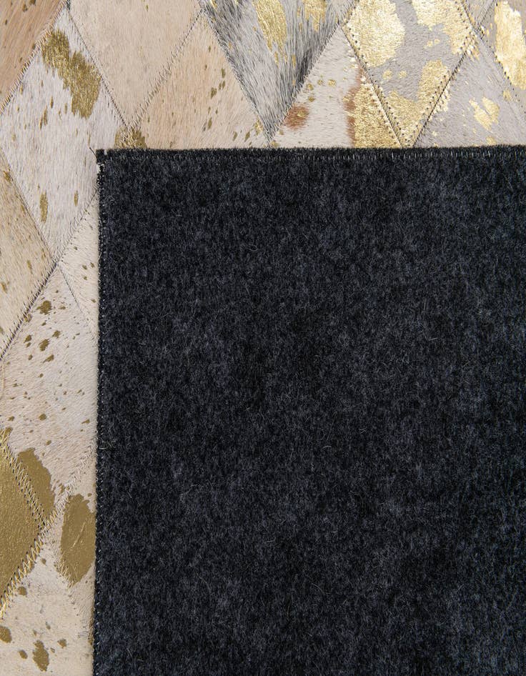 Detail image of 5' 2 x 8' 1 Cowhide Stocks Rug