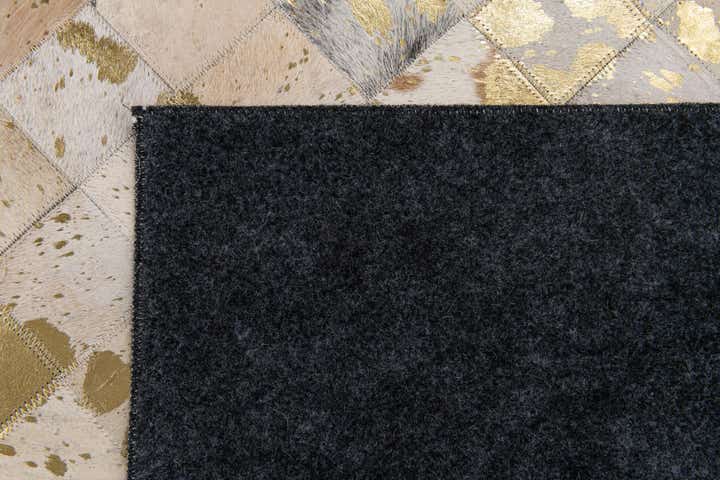 5' 2 x 8' 1 Cowhide Stocks Rug