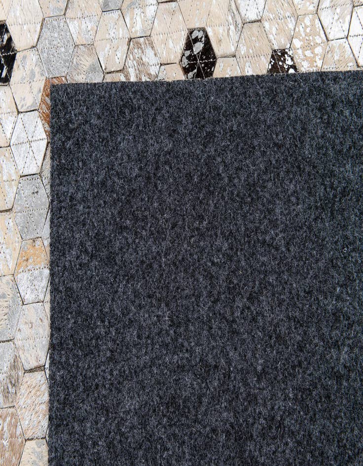 Detail image of 5' 4 x 7' 9 Cowhide Stocks Rug