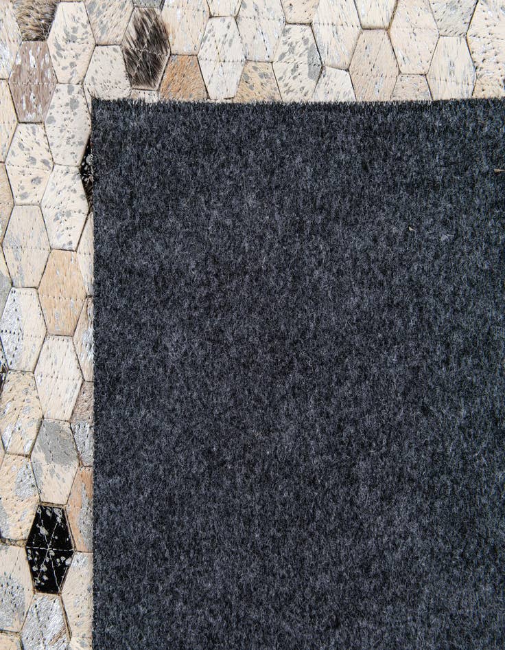 Detail image of 5' 3 x 7' 8 Cowhide Stocks Rug