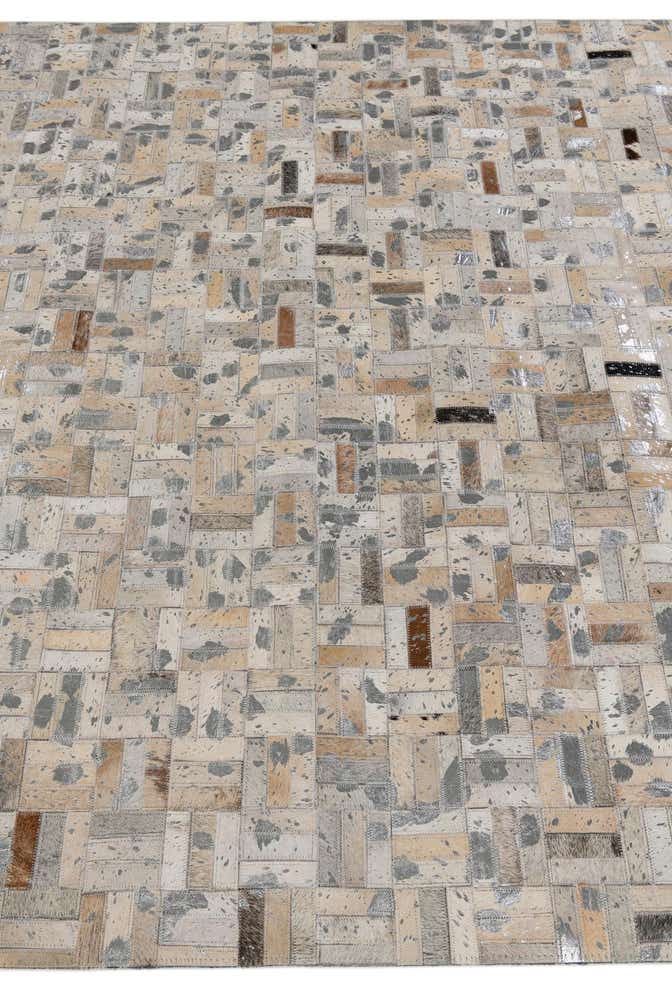 4' 11 x 8' 1 Cowhide Stocks Rug