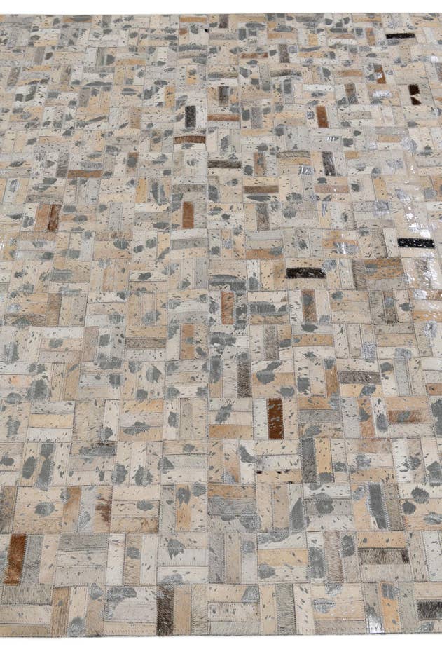 Detail image of 4' 11 x 8' 1 Cowhide Stocks Rug