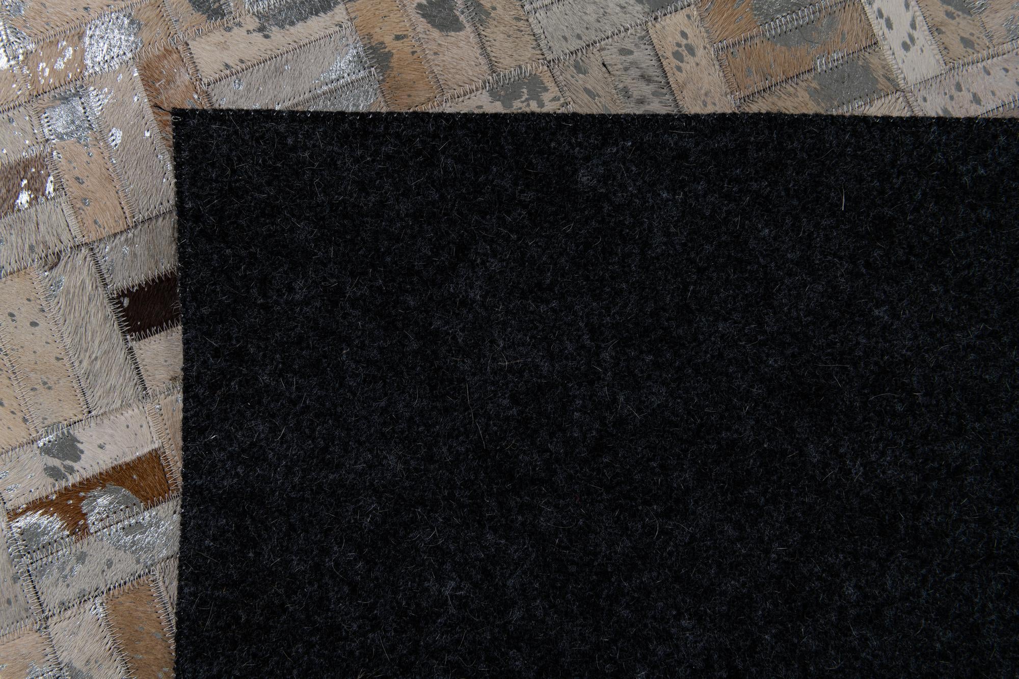 4' 11 x 8' 1 Cowhide Stocks Rug