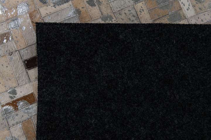 4' 11 x 8' 1 Cowhide Stocks Rug