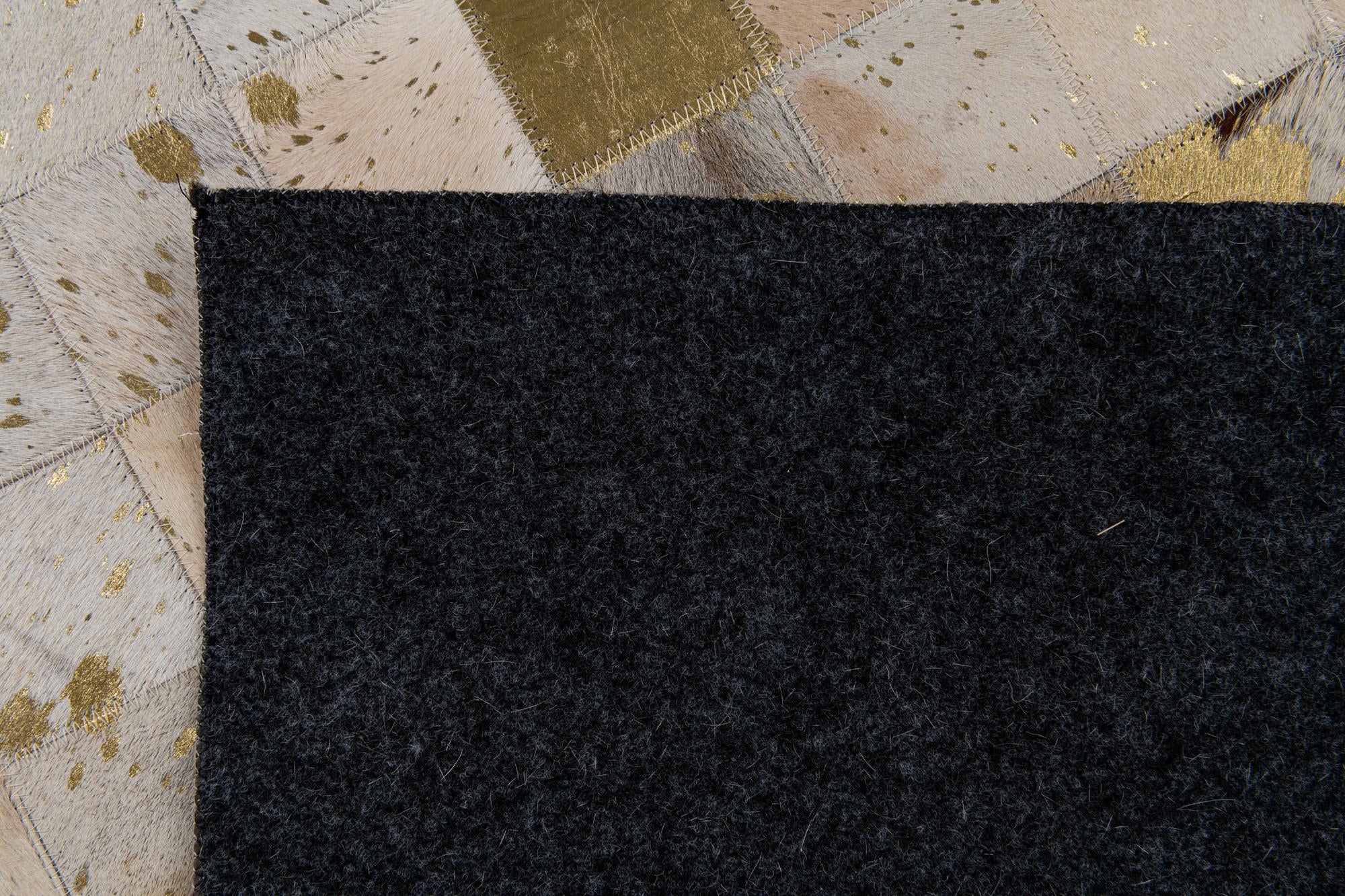 5' 1 x 7' 10 Cowhide Stocks Rug