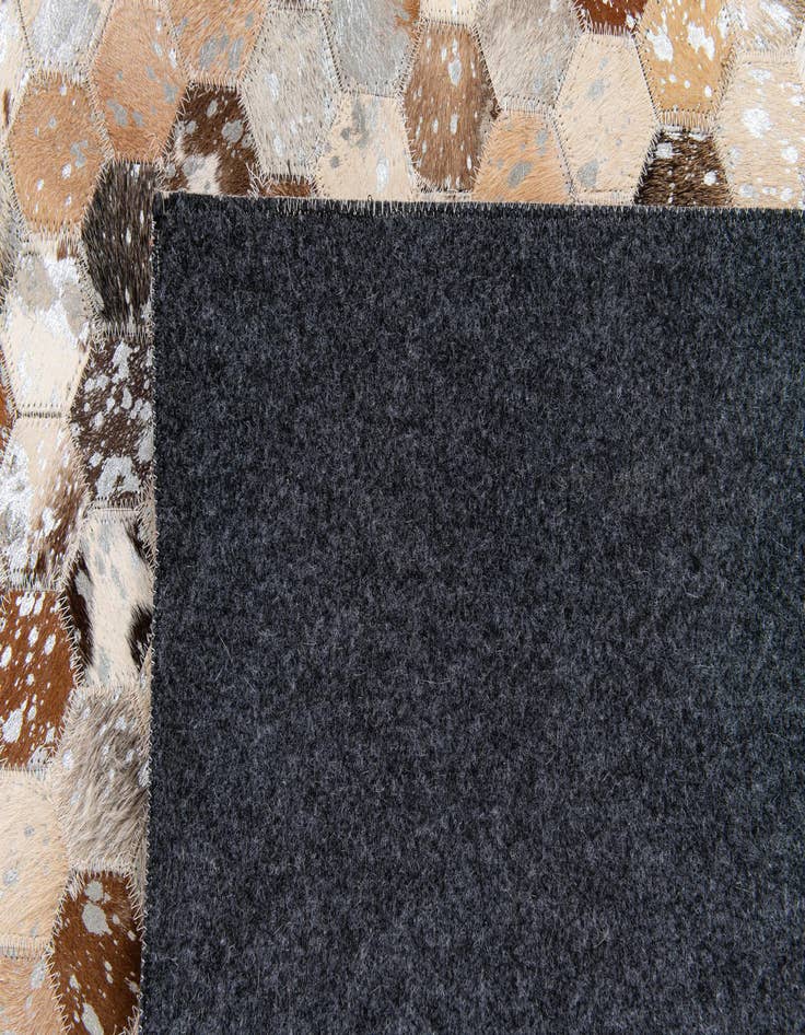 Detail image of 5' 5 x 7' 6 Cowhide Stocks Rug