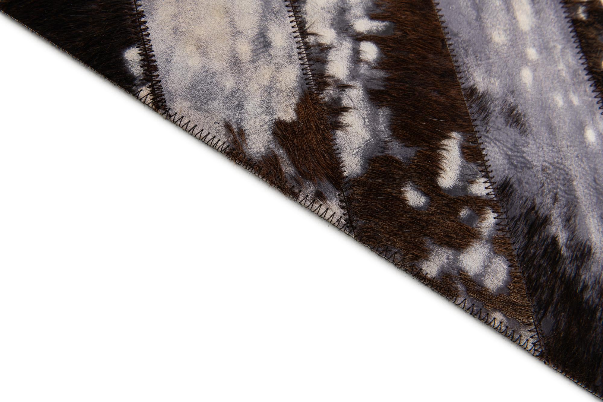 5' 1 x 8' Cowhide Stocks Rug