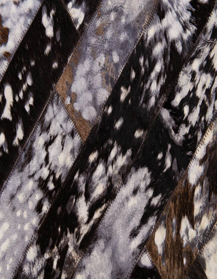 Detail image of 5' 1 x 8' Cowhide Stocks Rug