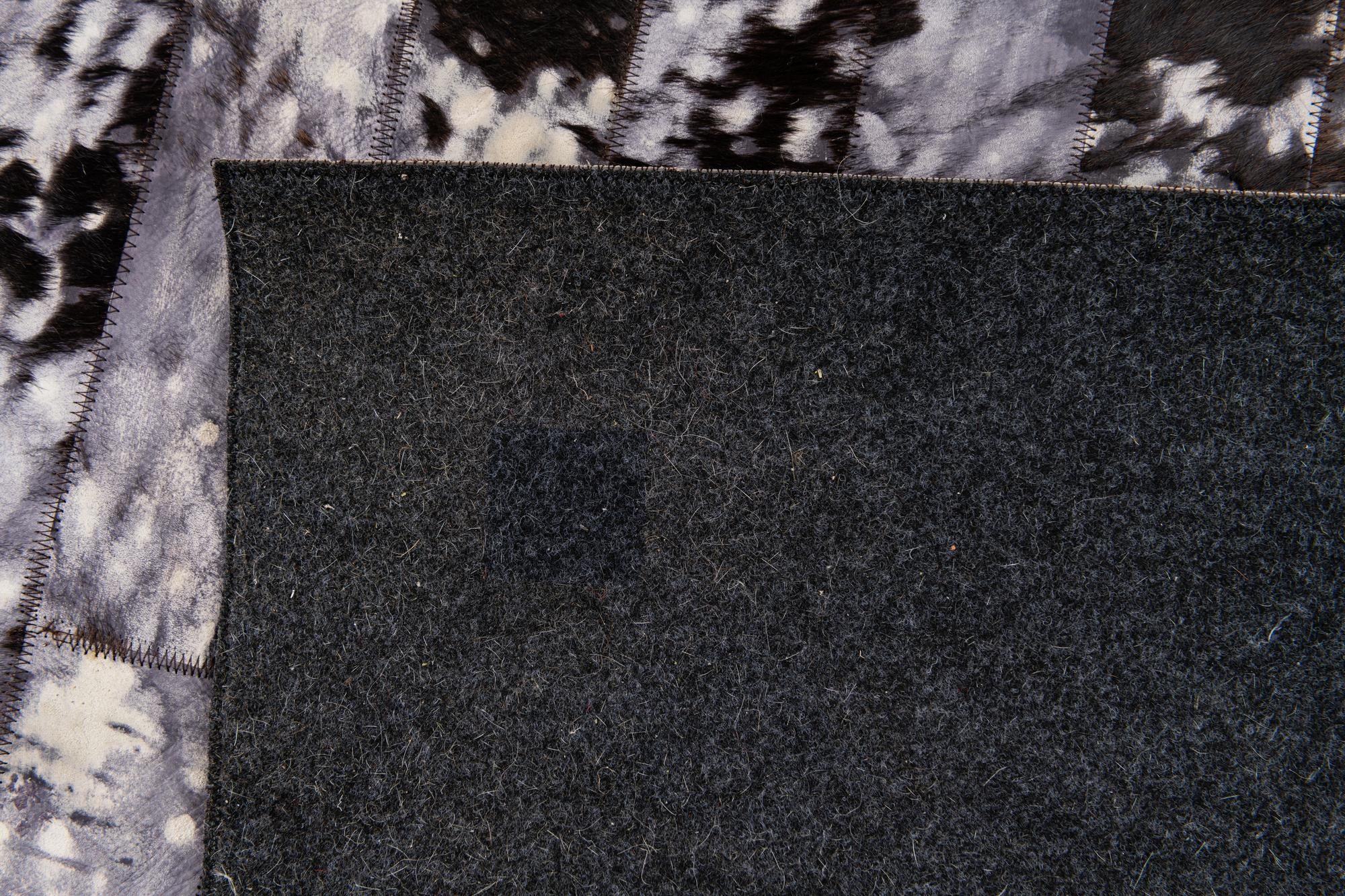 5' 1 x 8' Cowhide Stocks Rug