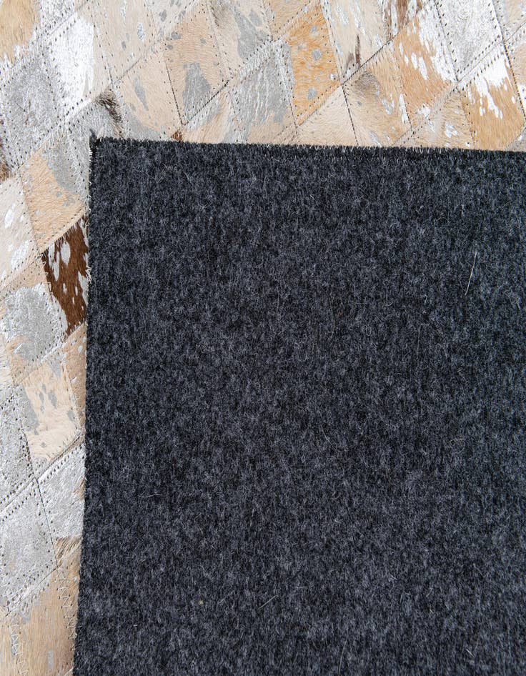 Detail image of 5' 5 x 7' 8 Cowhide Stocks Rug