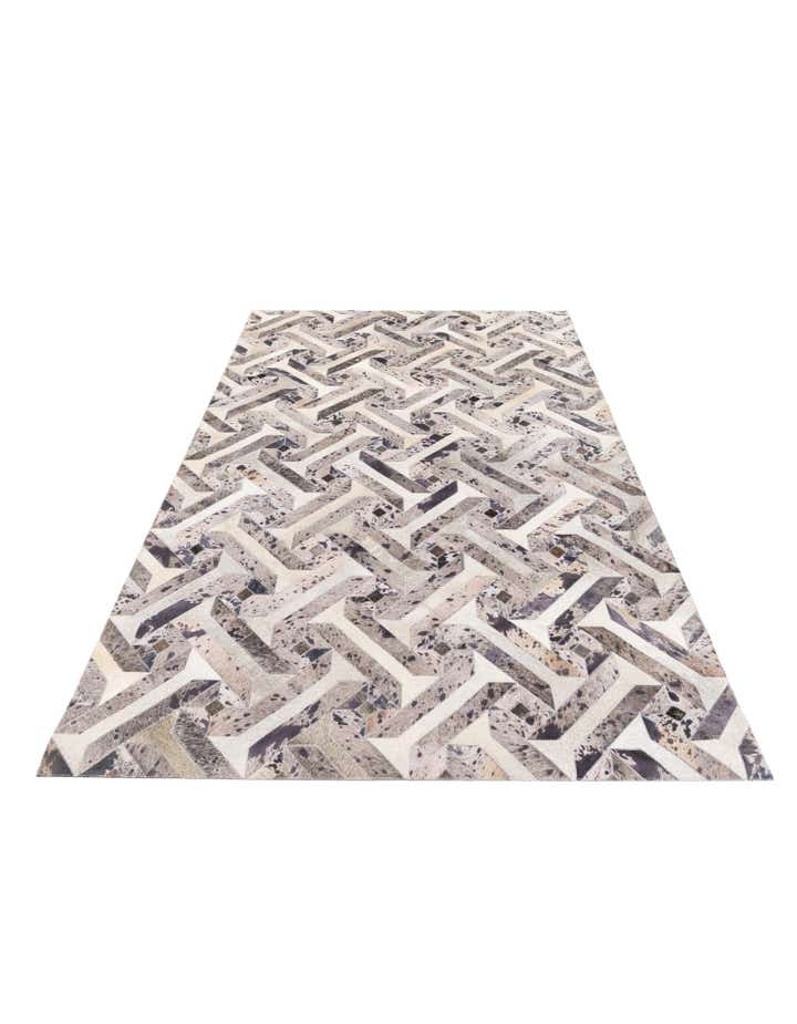 5' 2 x 8' 1 Cowhide Stocks Rug