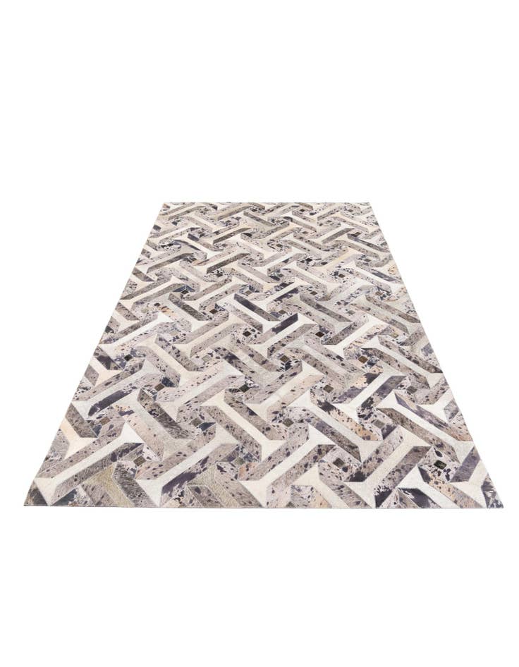 Detail image of 5' 2 x 8' 1 Cowhide Stocks Rug